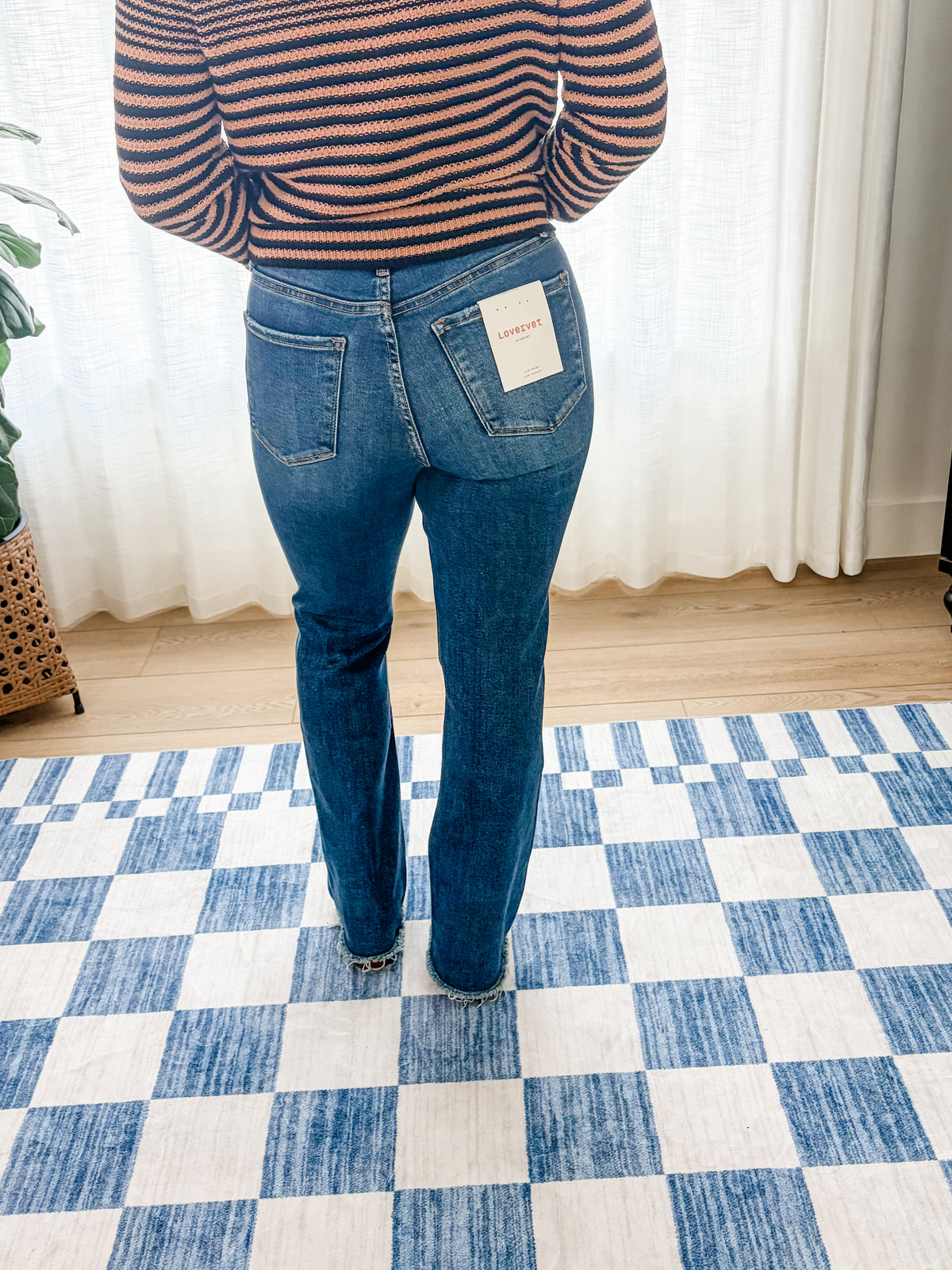 The Avery High Rise Raw Hem Bootcut Jeans