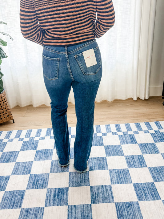 The Avery High Rise Raw Hem Bootcut Jeans