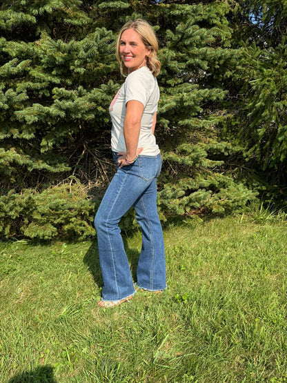 The Avery High Rise Raw Hem Bootcut Jeans